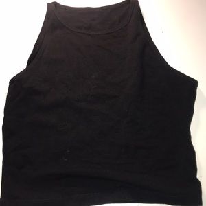 Sporty, cropped, tight fitting tee in xs.